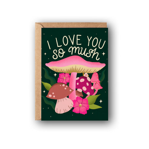 A Valentine's Day card is shown on a white background. The Card says "I Love you so Mush" In a playful hand lettering script. There is an illustration of vibrant whimsical mushrooms and fungi surrounded by florals and twinkling stars. There's an adorable snail on one of the mushrooms. This is a perfect card to celebrate your love in sweet, punny style!