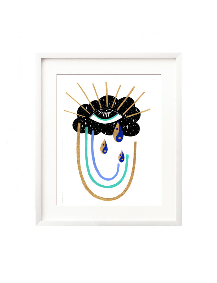 A framed art print - the illustration is of a cosmic intuitive eye in a starry cloud, it sheds tears that are small yin yangs, the eyelashes as rays emanate from above and a rainbow of vibrant blues and golds emerge at the bottom. Signifying the beauty that comes with clarity.