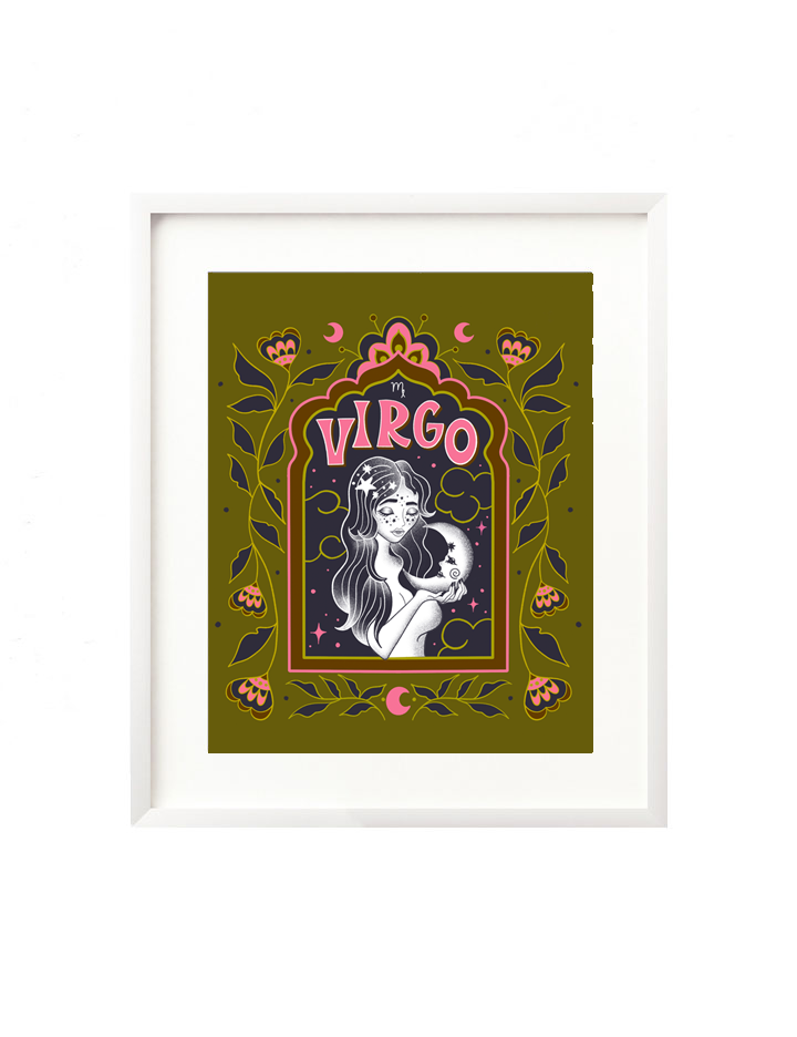 A framed art print - the illustration is a depiction of the Virgo zodiac sign. The celestial maiden is illustrated floating in a starry night sky, surrounded by whimsical clouds and framed in by folk art flowers. Virgo is hand lettered at the top in a bold, groovy, retro inspired style.